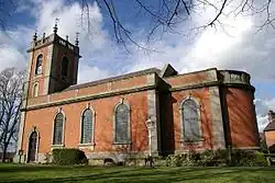 Red brick church with tower