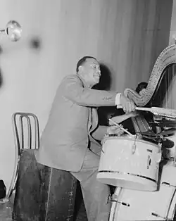 Singleton with Adele Girard on harp in 1939; photo: William P. Gottlieb